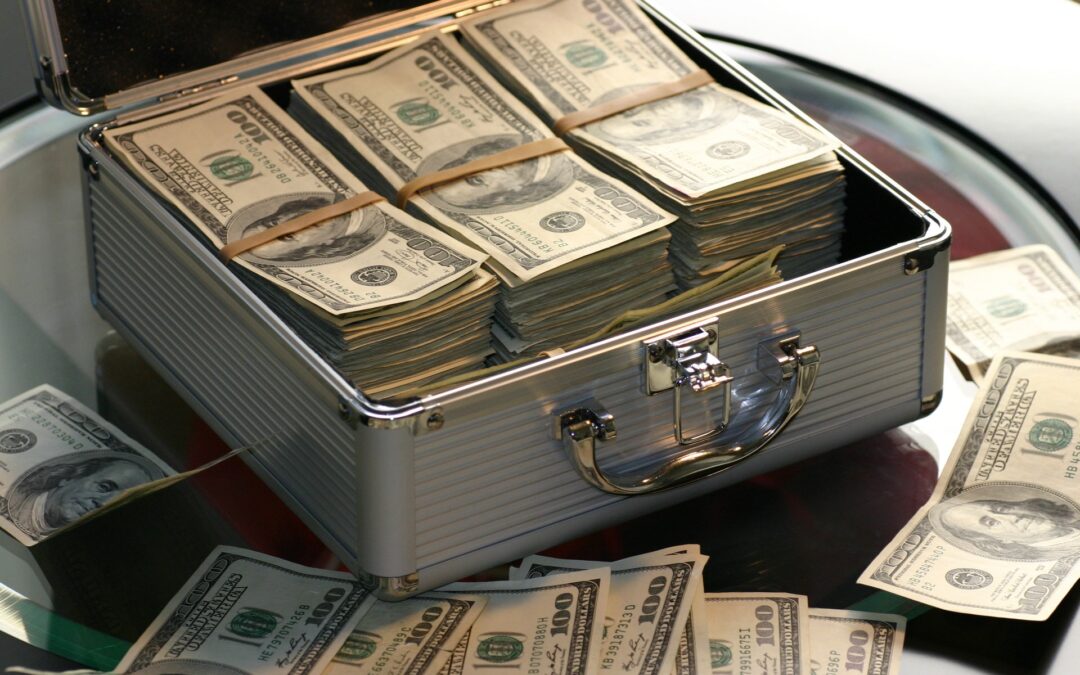 100 dollar bills in briefcase